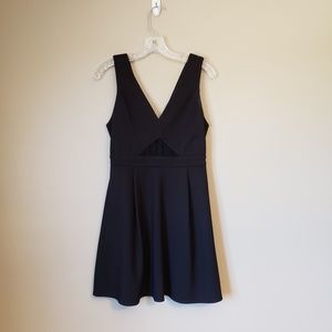 Black v-neck dress with lace inset